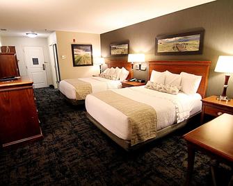 سيمون إن هوتل آند سويتس - غراند فوركس - غرفة نوم