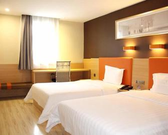 7天连锁酒店海口明珠广场五指山路店 - 海口 - 臥室