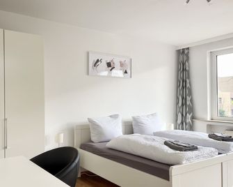 Moderne Studios im Herzen von Osnabrück - אוסנבריק - חדר שינה