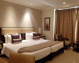 Sarovar Portico Surajkund - Faridabad - Slaapkamer
