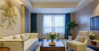 Hongteng International Hotel - Jinan - Living room