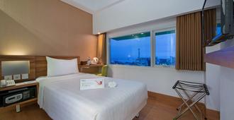 Whiz Prime Hotel Balikpapan - באליקפאפן - חדר שינה