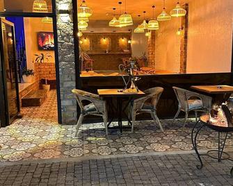 Aura Boutique Hotel - Side - Restaurant