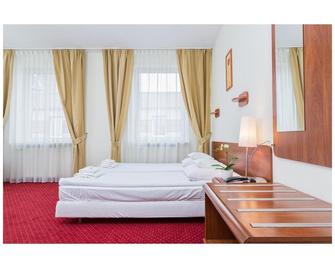 Hotel Colibra - Warschau - Schlafzimmer