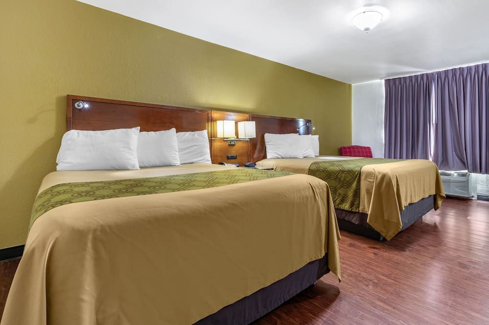 Rose City Inn & Suites - Tyler - Ložnice