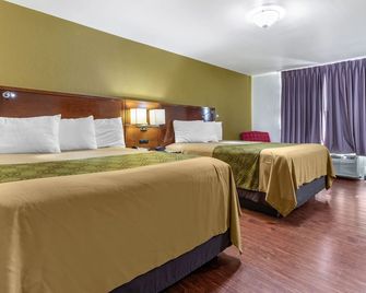 Rose City Inn & Suites - Tyler - Ložnice