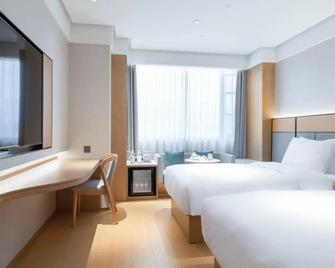 Glory Vogue Hotel - Chengdu - Schlafzimmer