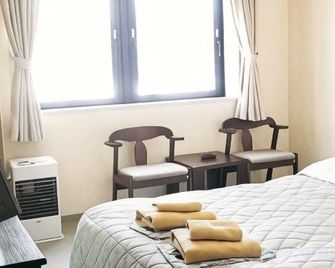 Business Platon Hotel - Asahikawa - Ložnice