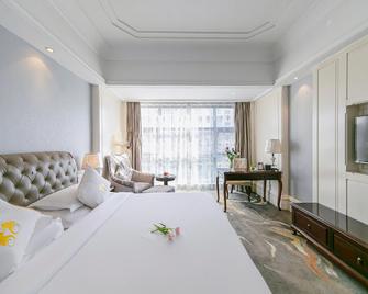 Rezen Hotel Zhoushan Tairu - Zhoushan - Bedroom