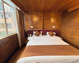 Hotel Apsara Darjeeling - דאריילינג - חדר שינה