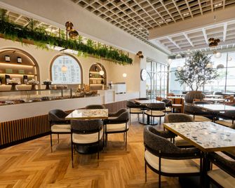 The First Collection Dubai Waterfront - Dubái - Restaurante