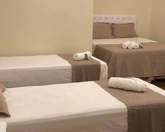 Pousada Encantos de Palmeiras - Palmeiras - Schlafzimmer