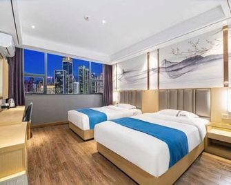 Rui Jia Business Hotel - Jingzhou - Bedroom