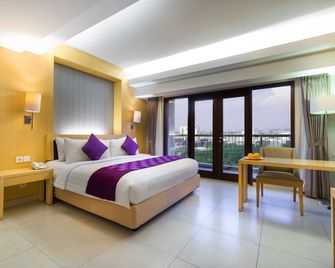 Quest Hotel Kuta - Kuta - Bedroom