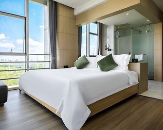 Chengdu Xishang Wanduo Hotel - Chengdu - Habitación