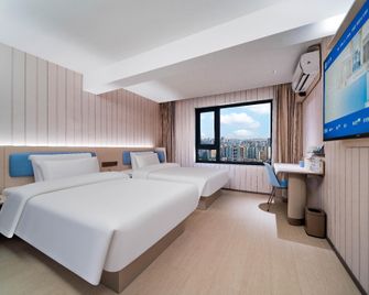 Hanting Hotel Chongqing Guanyinqiao Pedestian Street Center - Chongqing - Habitación