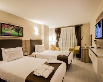 Hotel Business Han - נבשאיר - חדר שינה