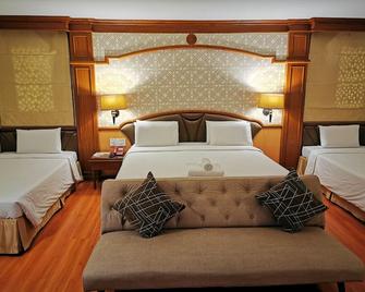 Sakol Hotel - Hat Yai - Schlafzimmer