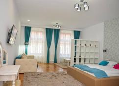 Central Apartments - Sibiu - Bedroom