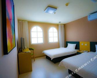 Shengjia Business Hotel Jilin East Gate - Jilin - Schlafzimmer