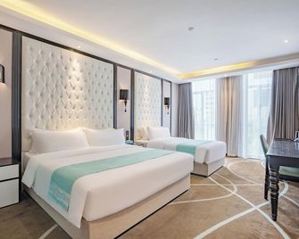 Pazhou XANA Deluxe International Hotel Pazhou Convention and Exhibition Center Changgang Metro Station Branch - Free Shuttle Bus to Canton Fair Complex During Canton Fair Period & Free Deliver Service to Guangzhou Baiyun International Airport - Guangzhou - Bedroom