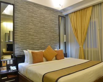 D'Hotel & Suites - Dipólog - Habitación