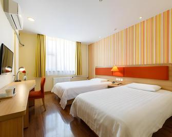 Home Inn Dezhou Dexing Road Xuefu - Dezhou - Спальня