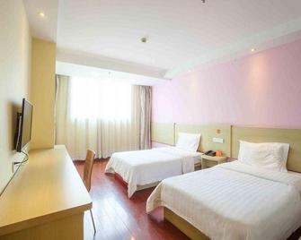 7 Days Inn Tianjin Chang Hong Park Railway Station - Tianjin - Bedroom