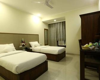 Hotel Rainbow Ghaziabad - Ghāziābād - Habitación