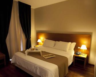 โรงแรมติเซียโน - ตราปานี - ห้องนอน