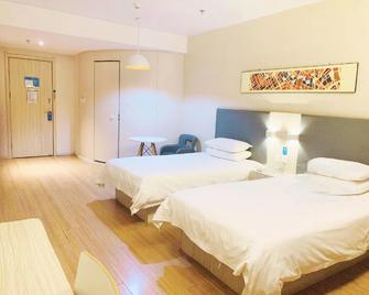 Hanting Hotel Changchun Yuanda Avenue - Changchun - Slaapkamer