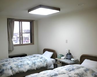 Date Business Hotel Castle - Noboribetsu - Makuuhuone