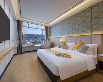 Holiday Inn Wetland - Ngawa - Bedroom