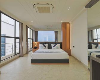 The Malay Comfort-Hotel Sunshine Inn - Somnāth - Bedroom