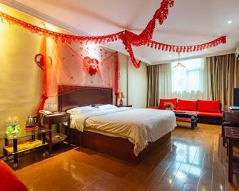 Greentree Inn Jining Jiaxiang County Jianshe South Road Express Hotel - Jining - Bedroom