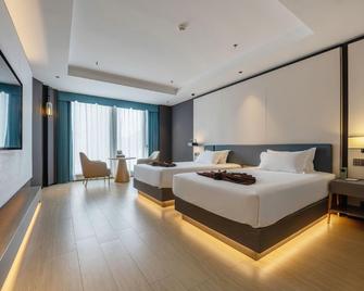 Dongfang Yijing Hotel - Lishui - Slaapkamer