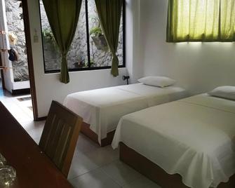 Galapagos House - Hostal - Puerto Ayora - Slaapkamer