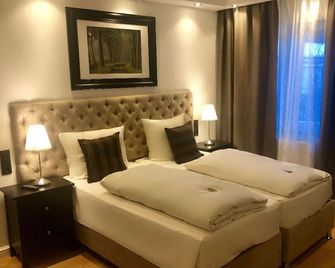 Hotel Ramor Garni - דיסבורג - חדר שינה