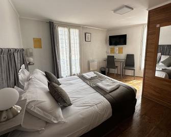 Hôtel Beauséjour - Annot - Camera da letto