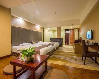 Created Ashton Business Hotel - Wuzhou - Slaapkamer