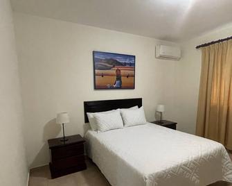 Apartahotel Alvear - Santo Domingo - Bedroom