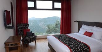 WoodSmoke resort & Spa - Shimla - Slaapkamer