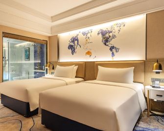 Kailiyade Hotel(Shiyan Wuyanstore) - Shiyan - Bedroom