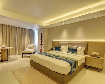 The Ssk Solitaire Boutique Hotel And Spa - Nashik - Schlafzimmer