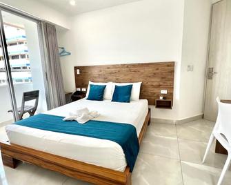 أبارتا هوتل تشايراما - بلدية سانتا مارتا - غرفة نوم