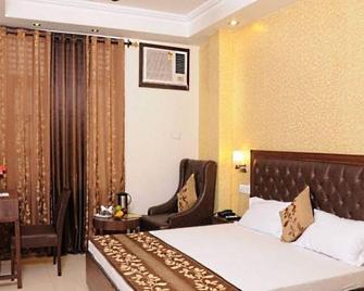 Hotel Diamond Inn - Çandigarh - Yatak Odası