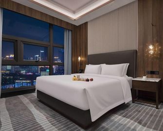 Kang Nian Shi Jia Hotel - Changsha - Bedroom