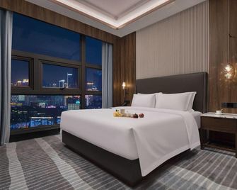 Kang Nian Shi Jia Hotel - تشانغشا - غرفة نوم