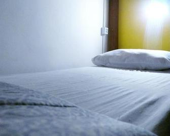 É Hostel - אורו פרטו - חדר שינה