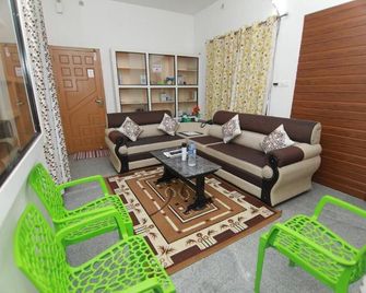 Natureland Homestay - Kottayam - Sala de estar